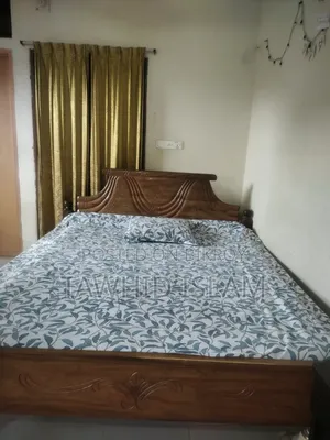 Bed with Mattress, Chair, and Table for Sale