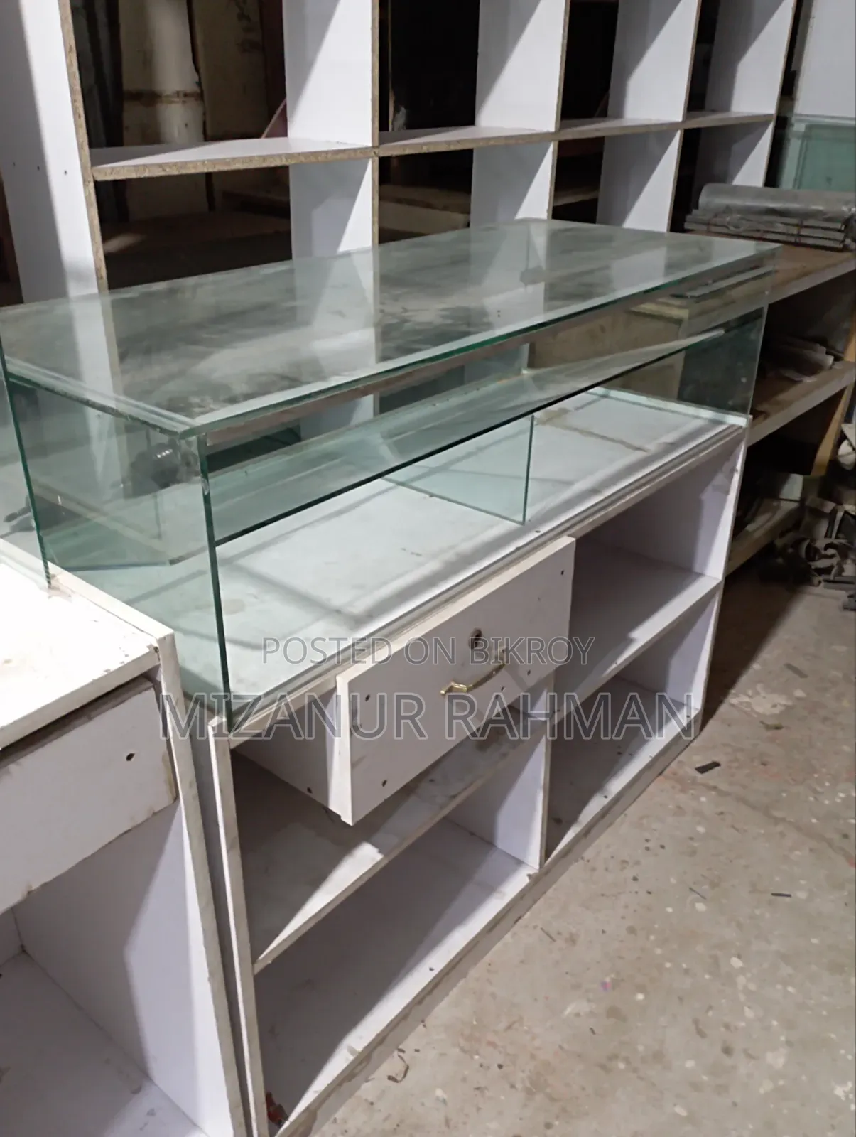 Old new racks, tables, almirahs, counters are available.