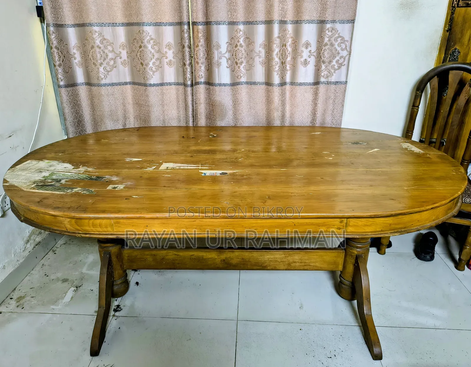 A complete solid teak wood dining table and 6 chairs will be sold.
