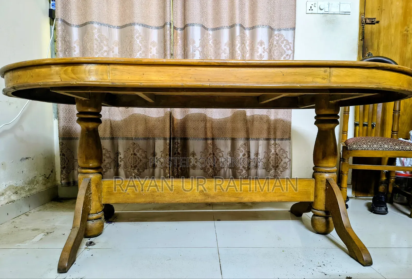 A complete solid teak wood dining table and 6 chairs will be sold.