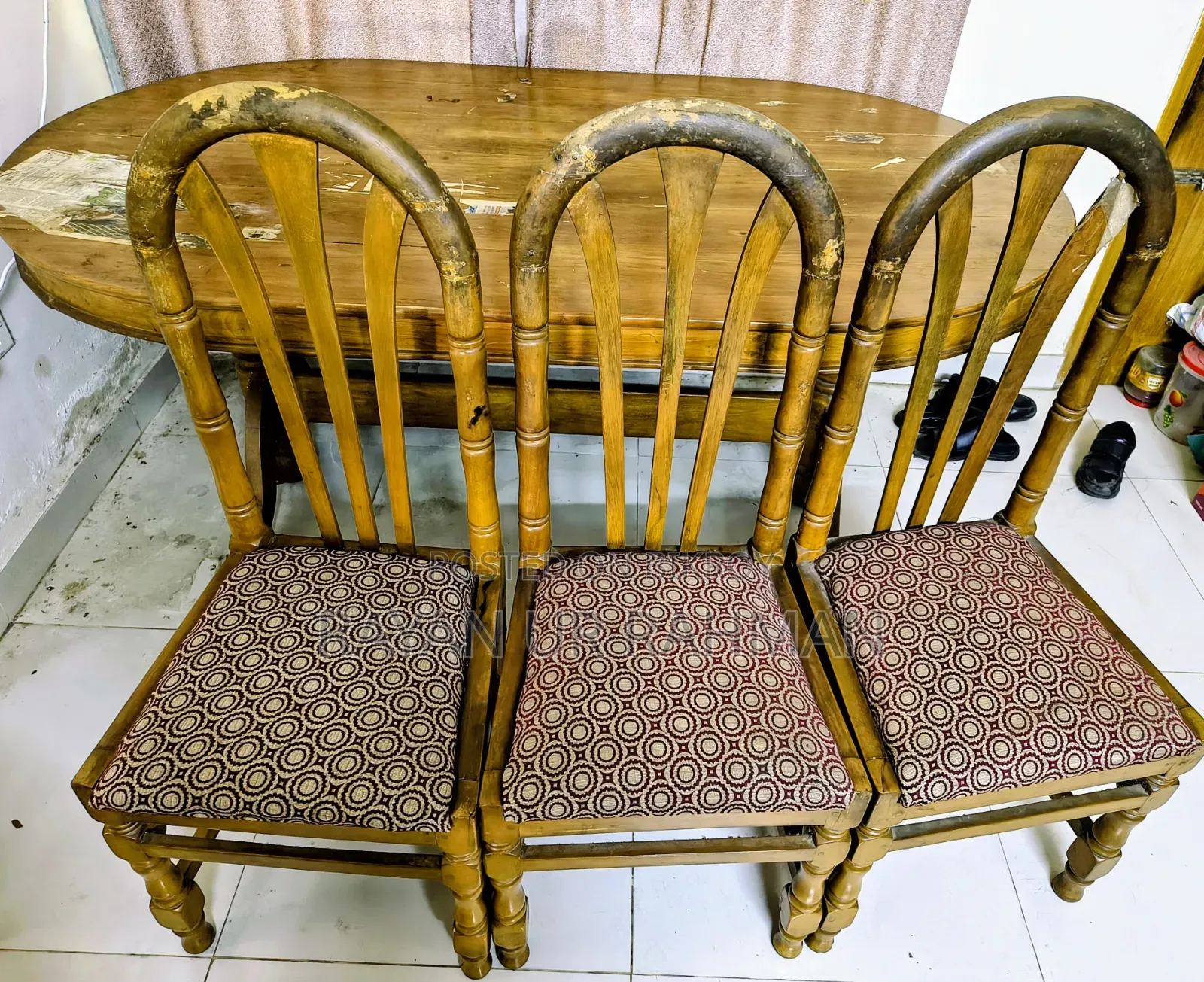 A complete solid teak wood dining table and 6 chairs will be sold.