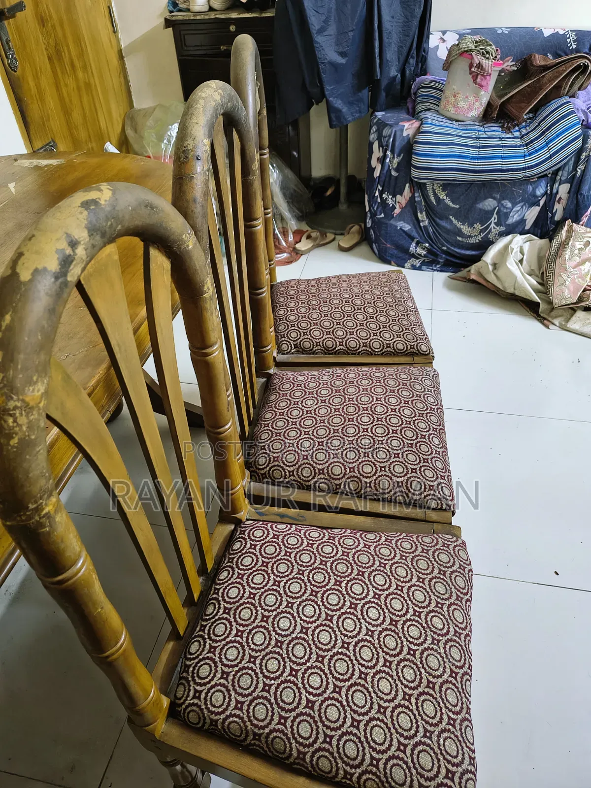 A complete solid teak wood dining table and 6 chairs will be sold.