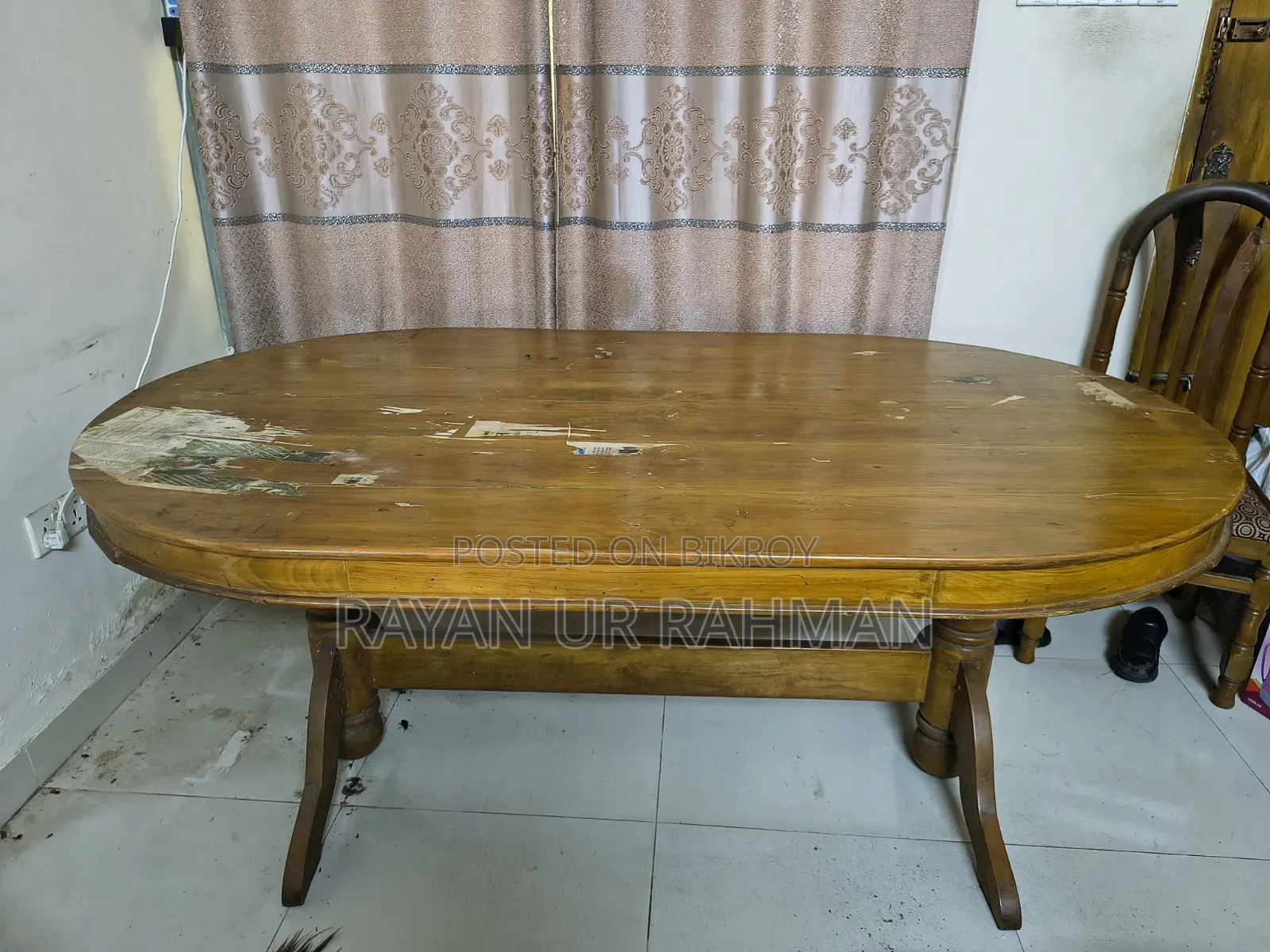 A complete solid teak wood dining table and 6 chairs will be sold.