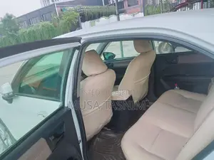 টয়োটা অ্যাক্সিও ১.৫ জি টু-হুইল ড্রাইভ ২০১২ সাদা