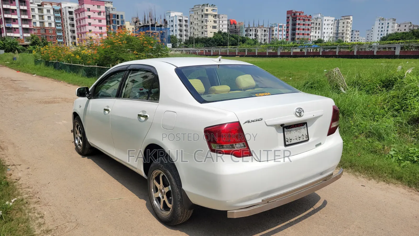 টয়োটা এক্সিও ২০১২ সাদা