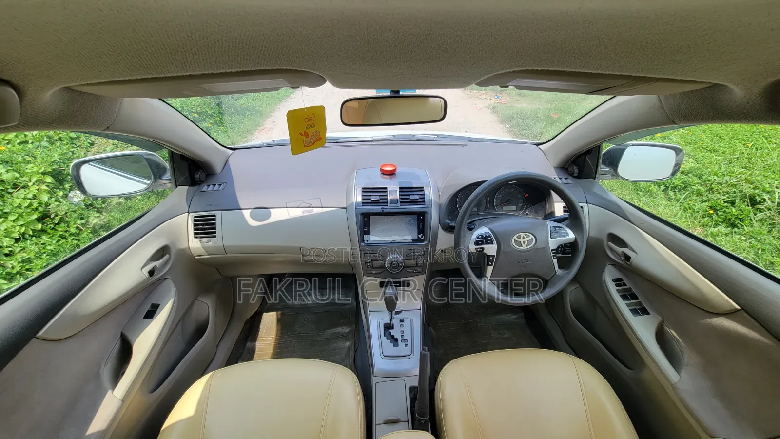 টয়োটা এক্সিও ২০১২ সাদা