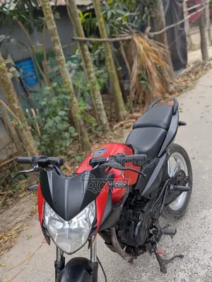 বাজাজ পালসার ১৩৫ এলএস ২০১১ লাল