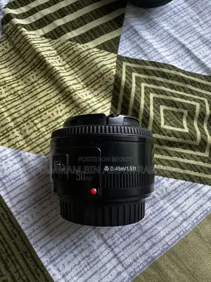 Canon 70D With Canon 18-135mm & Youngnu 50mm