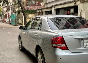 টয়োটা এক্সিও ১.৫ জি টু-হুইল ড্রাইভ ২০১০ সিলভার