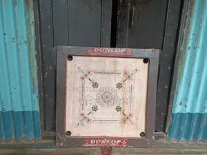 Take away carrom board at a nominal price