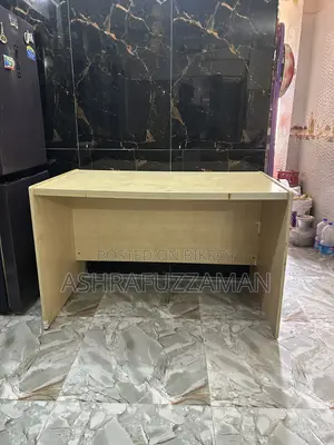 An office table and a high quality moving chair will be sold