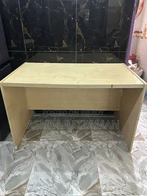 An office table and a high quality moving chair will be sold