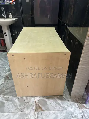 An office table and a high quality moving chair will be sold