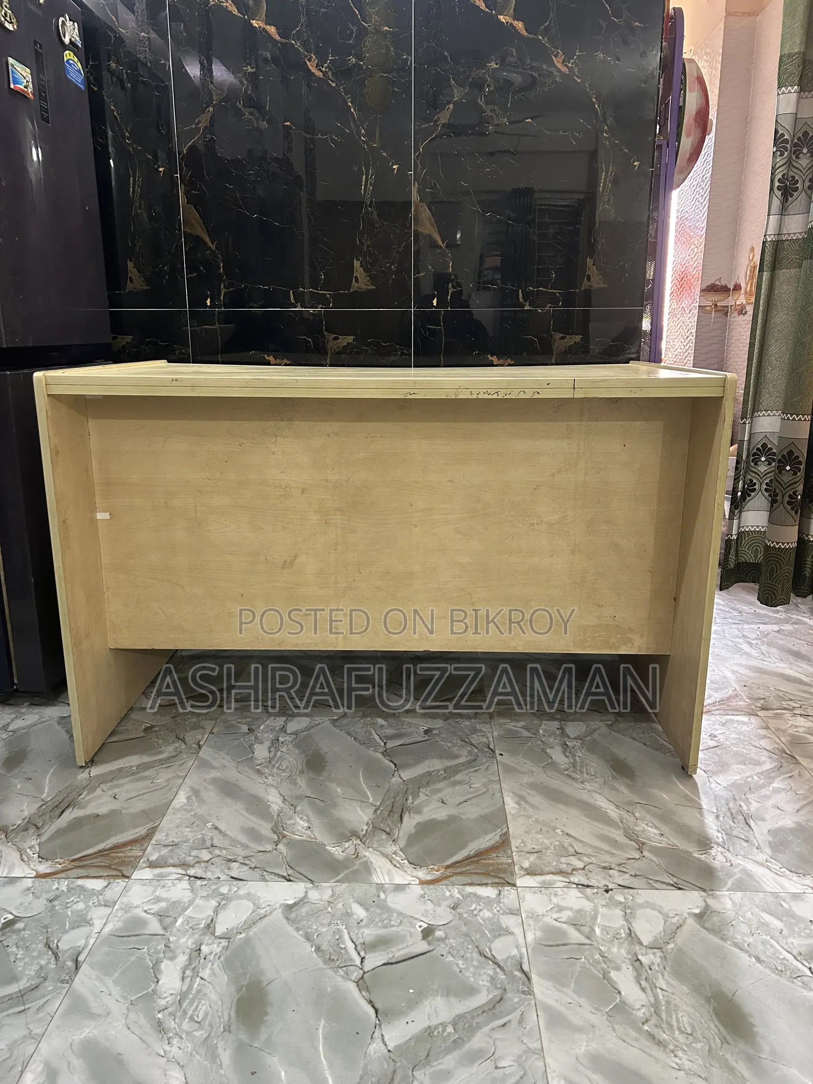 An office table and a high quality moving chair will be sold