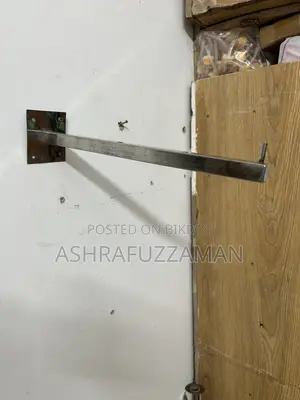 Wall hanger for clothes in shops and homes