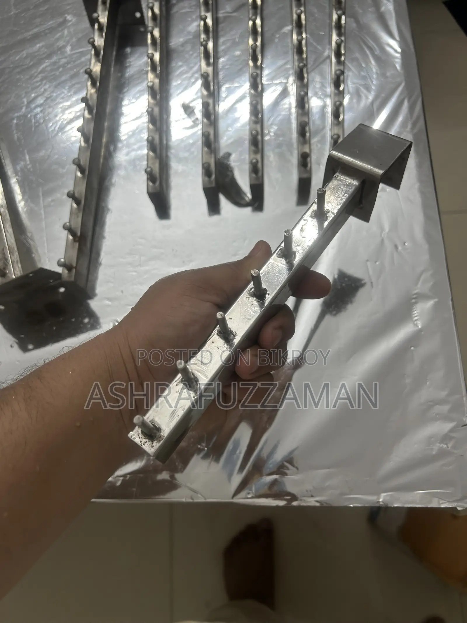 Wall hanger for clothes in shops and homes