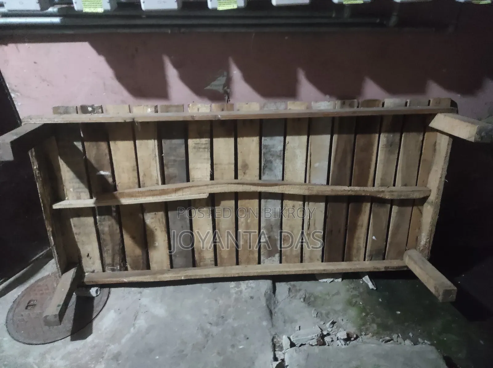 Wooden bed for sale.