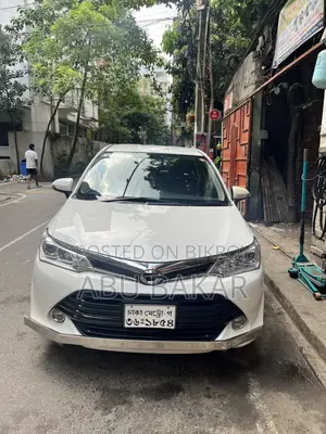টয়োটা অ্যাক্সিও ১.৫ জি ২ডব্লিউডি ২০১৫ সাদা