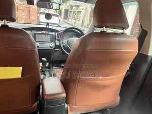 টয়োটা অ্যাক্সিও ১.৫ জি ২ডব্লিউডি ২০১৫ সাদা