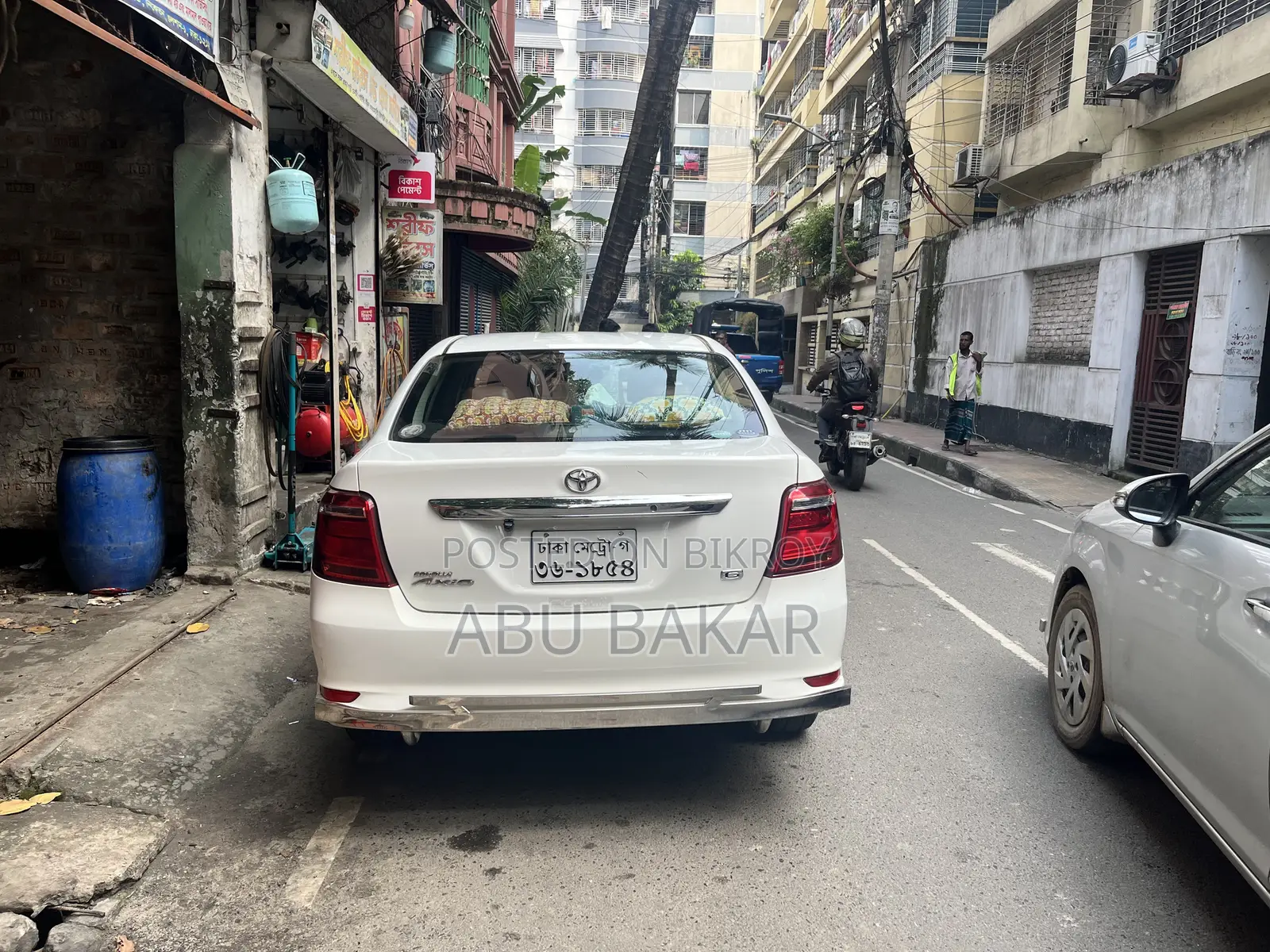 টয়োটা অ্যাক্সিও ১.৫ জি ২ডব্লিউডি ২০১৫ সাদা