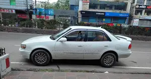 টয়োটা করোল্লা ১.৬ সেডান ১৯৯৭ সাদা