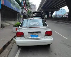 টয়োটা করোল্লা ১.৬ সেডান ১৯৯৭ সাদা