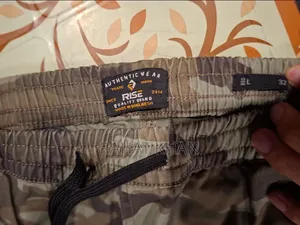 RISE Camo Cargo Joggers + Light-Wash Denim Jeans