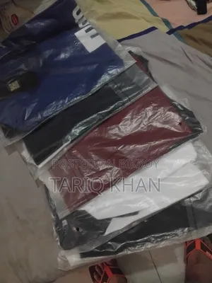 5 T-shirts for sale.