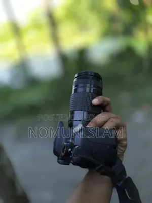 ক্যানন ১২০০ডি + জুম লেন্স ৩০০মিমি