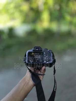 ক্যানন ১২০০ডি + জুম লেন্স ৩০০মিমি