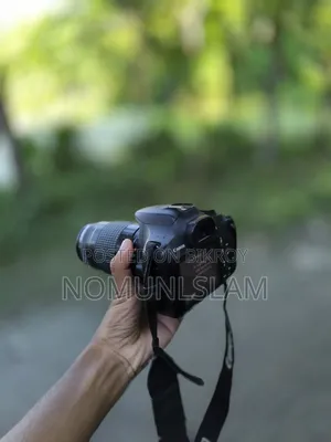 ক্যানন ১২০০ডি + জুম লেন্স ৩০০মিমি