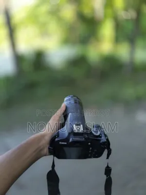 ক্যানন ১২০০ডি + জুম লেন্স ৩০০মিমি