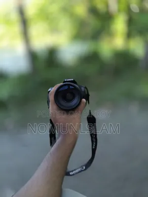 ক্যানন ১২০০ডি + জুম লেন্স ৩০০মিমি