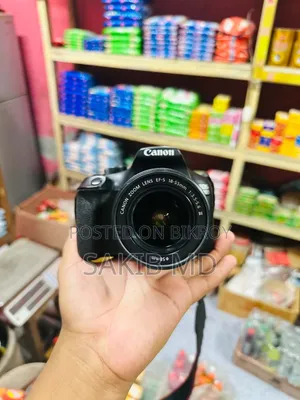 Canon EOS 1300D DSLR Camera + 18-55mm Lens