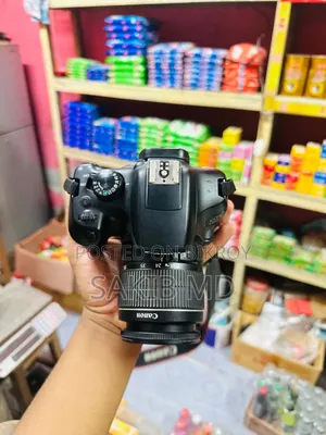 Canon EOS 1300D DSLR Camera + 18-55mm Lens