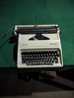 Olimpia Karina2 Typewriter Sell With Full Suitcase