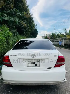 টয়োটা এক্সিও ১.৫ এক্স ২ডব্লিউডি ২০১০ সাদা