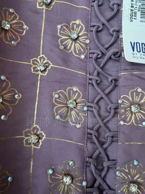 Unused dress from Vouge by Princess will be sold