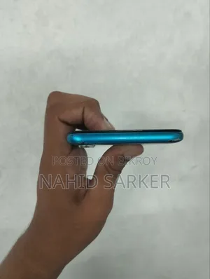 রিয়েলমি ৫আই ৬৪ জিবি নীল