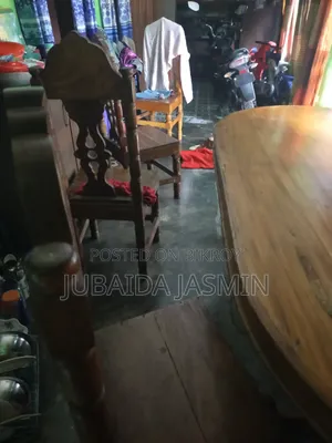 "Used Wooden Dining Table with 4 Chairs for Sale"