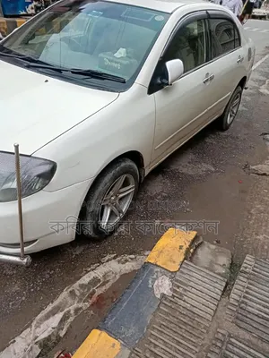 টয়োটা করোল্লা ২০০৪ সাদা