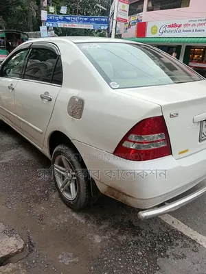 টয়োটা করোল্লা ২০০৪ সাদা