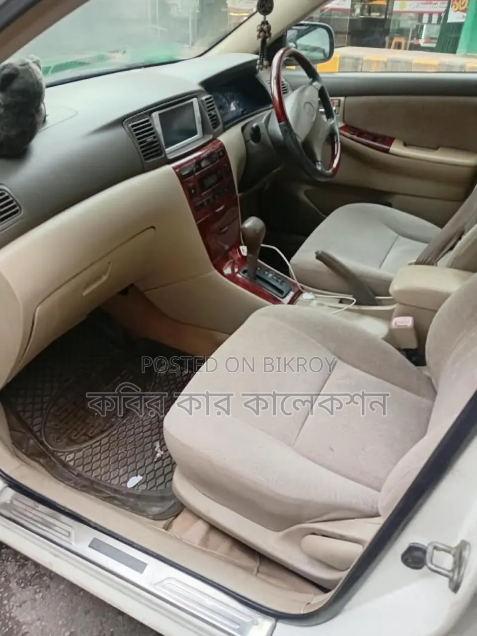 টয়োটা করোল্লা ২০০৪ সাদা