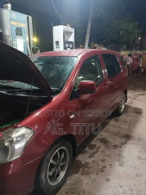 টয়োটা রাউম ১.৫ এডব্লিউডি ২০০৬ লাল