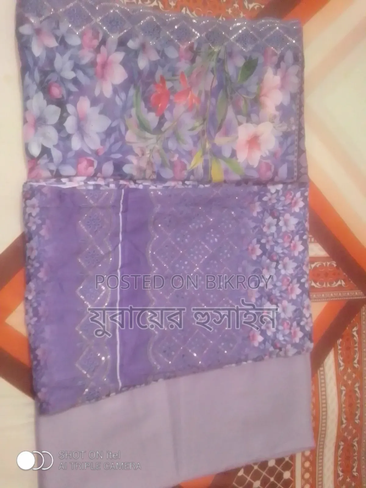 শুতি কাপড়ের মধ্যে জামা ওরনায় এম্বোডারি ও সিকোয়েন্স এর কাজ করা।