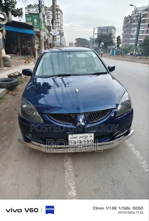 মিতসুবিশি ল্যান্সার সেডিয়া ২০০৪ নীল