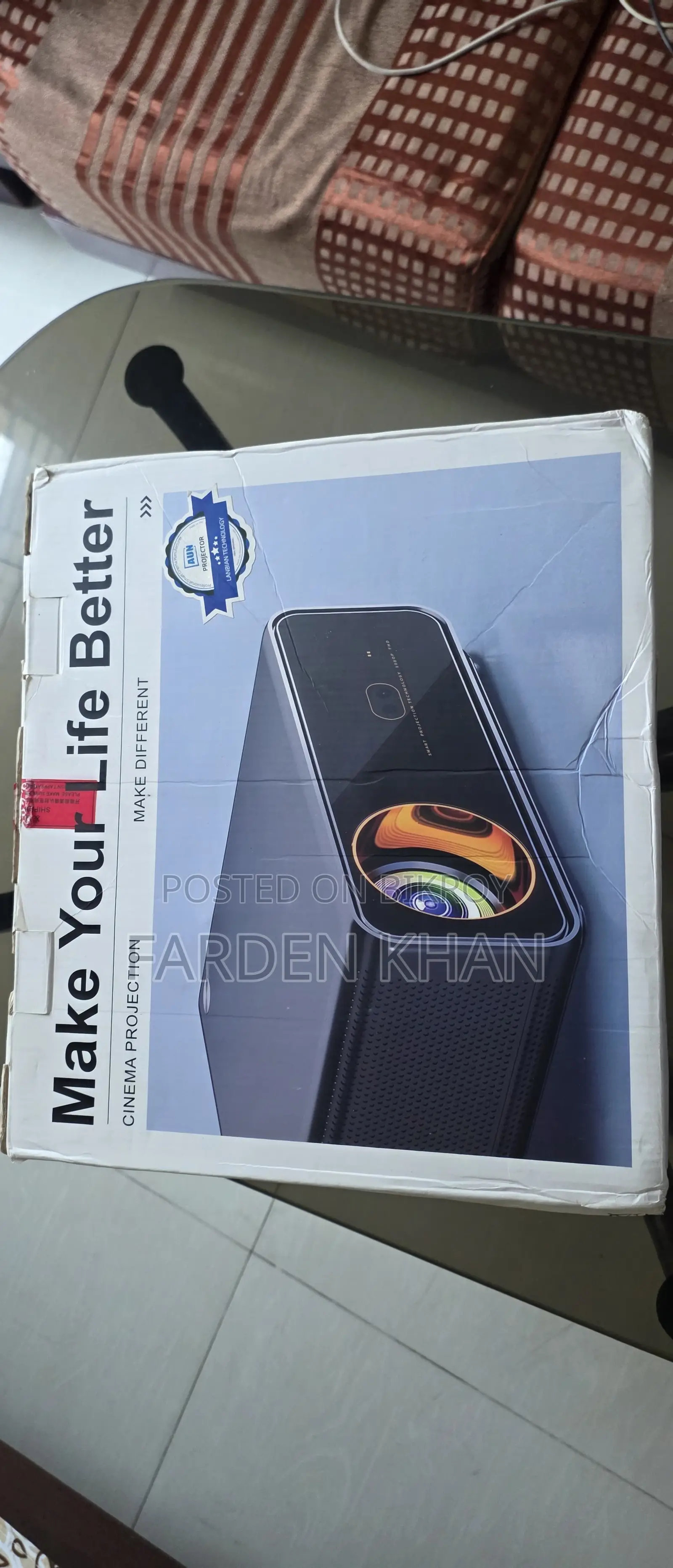 অুন ইউ০০১ প্রজেক্টর