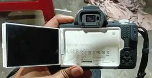 ক্যানন ইওএস এম৫০ মিররলেস ক্যামেরা (সাদা বডি + ১৫-৪৫৫মিমি লেন্স)