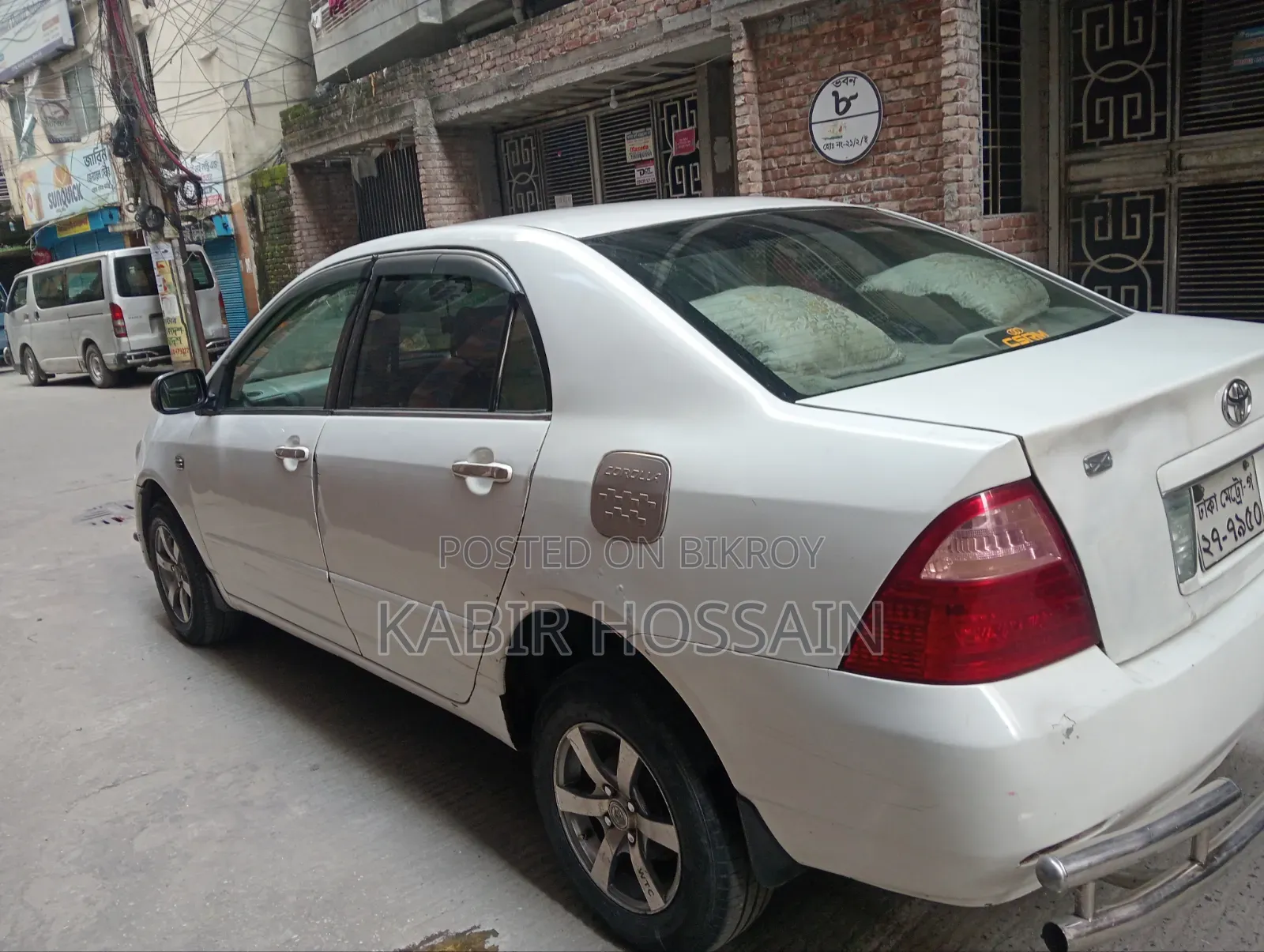 টয়োটা করোল্লা সেডান ২০০৪ হোয়াইট