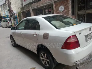 টয়োটা করোল্লা সেডান ২০০৪ হোয়াইট